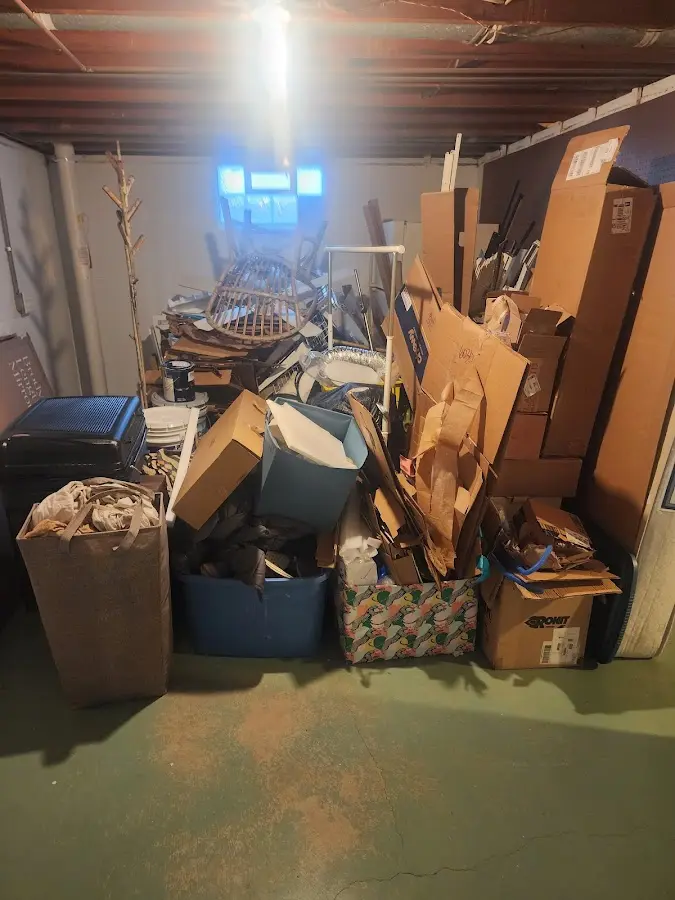 Roll-off dumpster container at job site for 2 Yard Dumpster Rental in Puhi